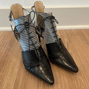 CHRISTIAN DIOR Black pressed leather heels/booties